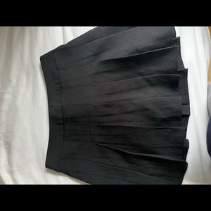 black pleated skirt